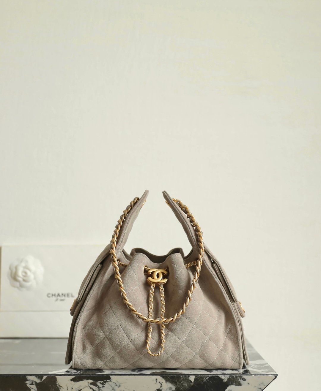 Chanel 25 Small Hobo Bag Chocolate Suede detail image 1 sourced from womanlvbag.com