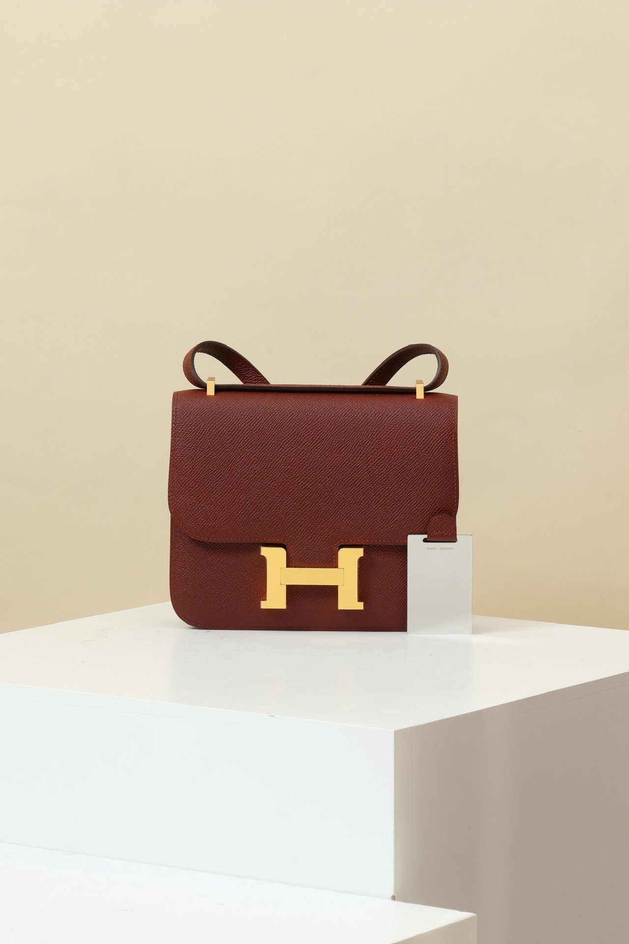 Hermès Constance 19 – Epsom Calfskin 55 Rouge H GHW detail image 1 sourced from womanlvbag.com