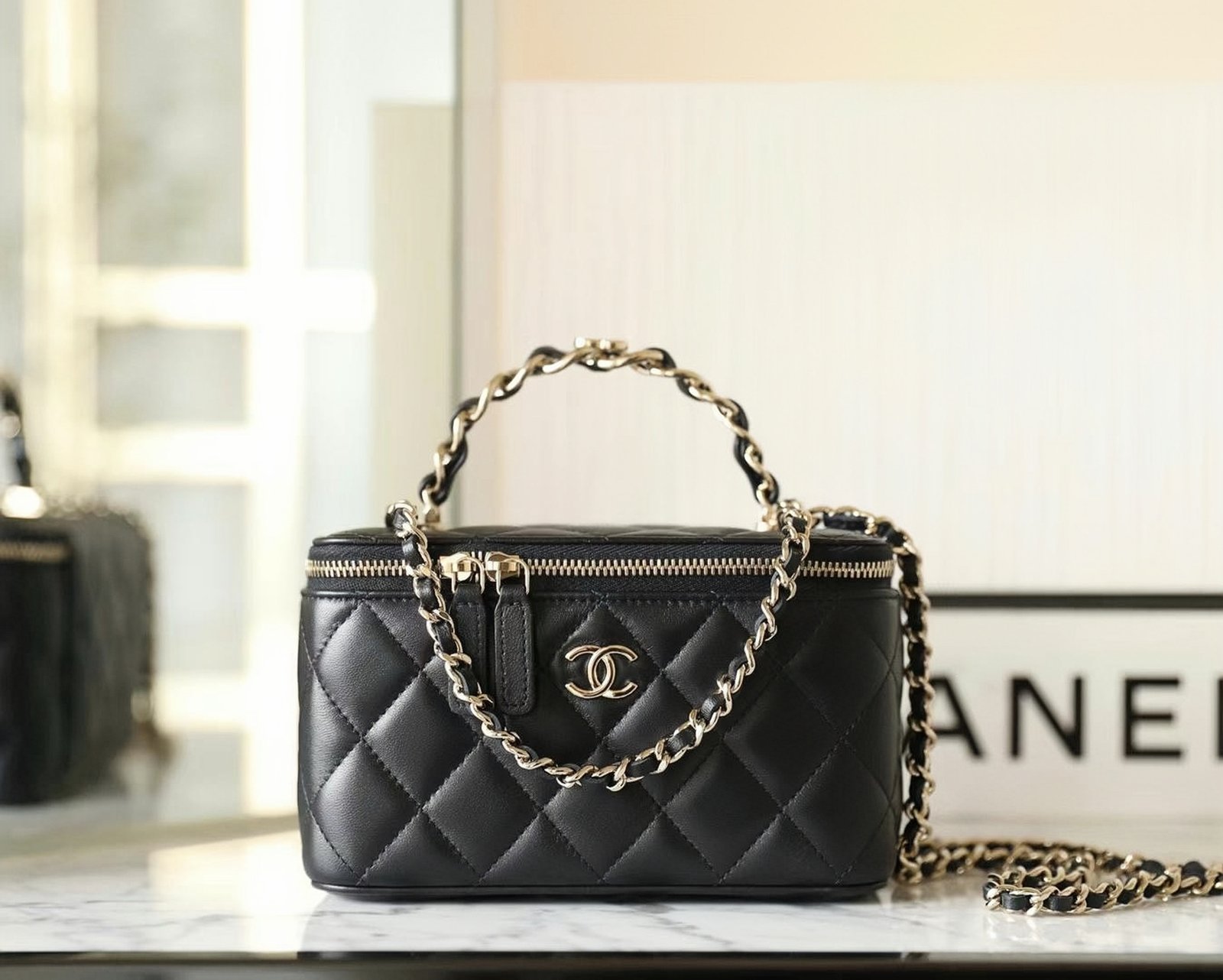CHANEL Vanity with Chain & Handle – Black Lambskin & 14K Light Gold detail image 1 sourced from womanlvbag.com
