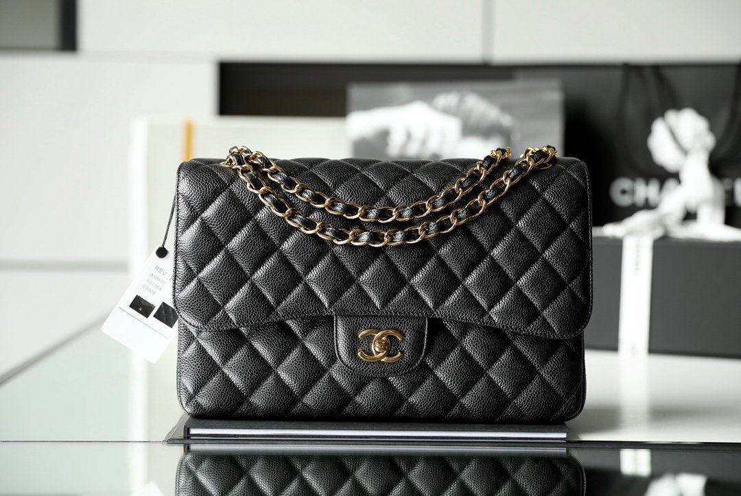 CHANEL Jumbo Classic Double Flap Bag – Black Caviar Leather with 24K Light Gold Hardware detail image 1 sourced from womanlvbag.com