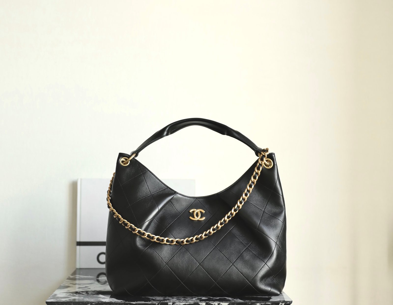 CHANEL Large Hobo Handbag – Black Lambskin & 24K Vintage Gold detail image 1 sourced from womanlvbag.com