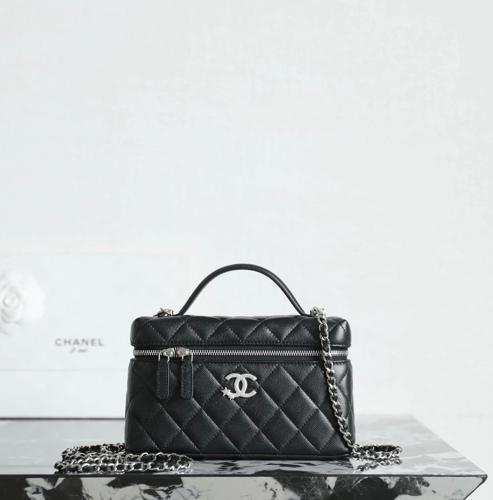 CHANEL Vanity Case with Chain – Black Caviar Leather with Star & Crystal Silver Hardware detail image 1 sourced from womanlvbag.com
