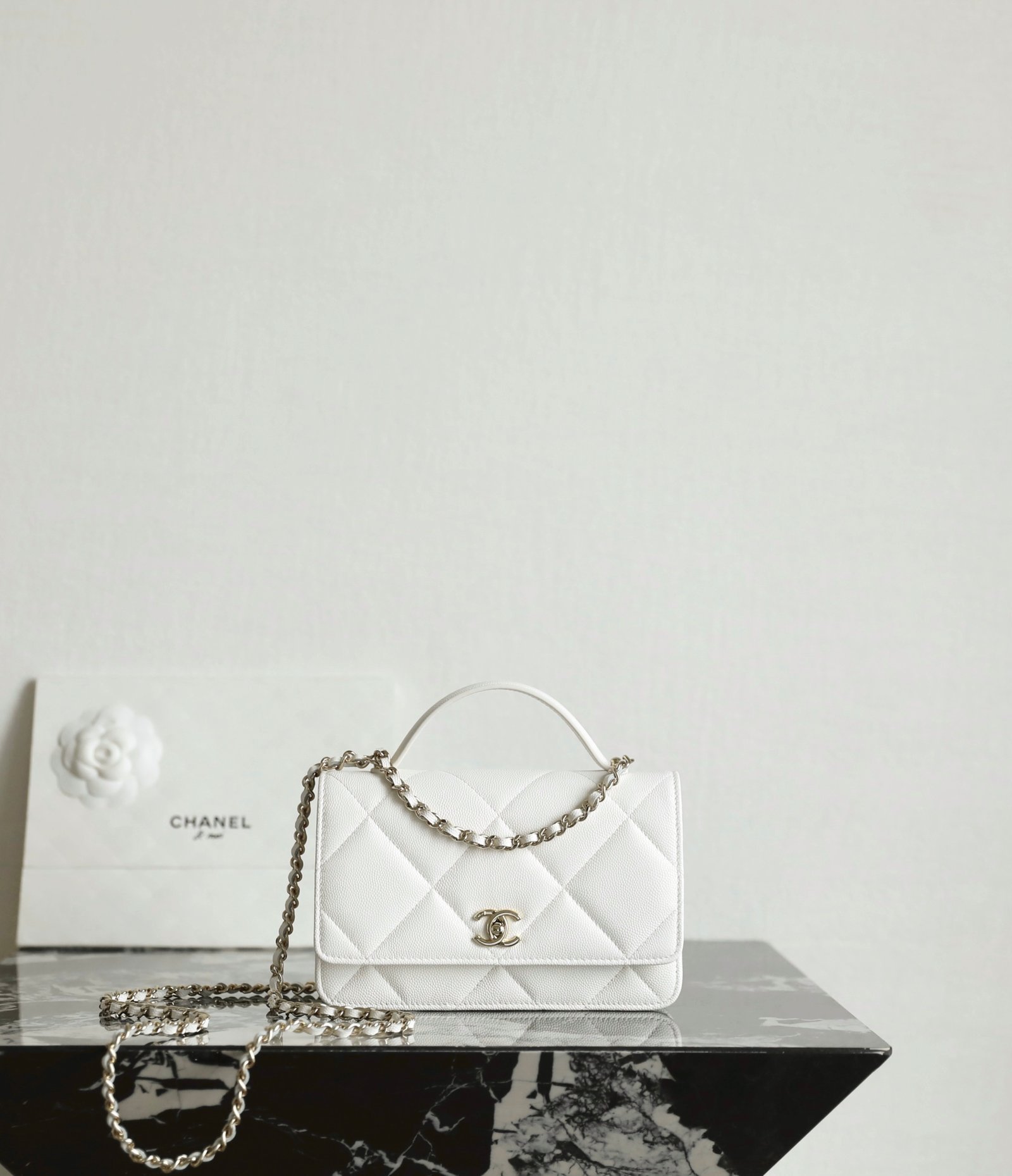 CHANEL Trendy CC Handle Wallet On Chain (WOC) – White Caviar Leather & 14K Light Gold Hardware detail image 1 sourced from womanlvbag.com