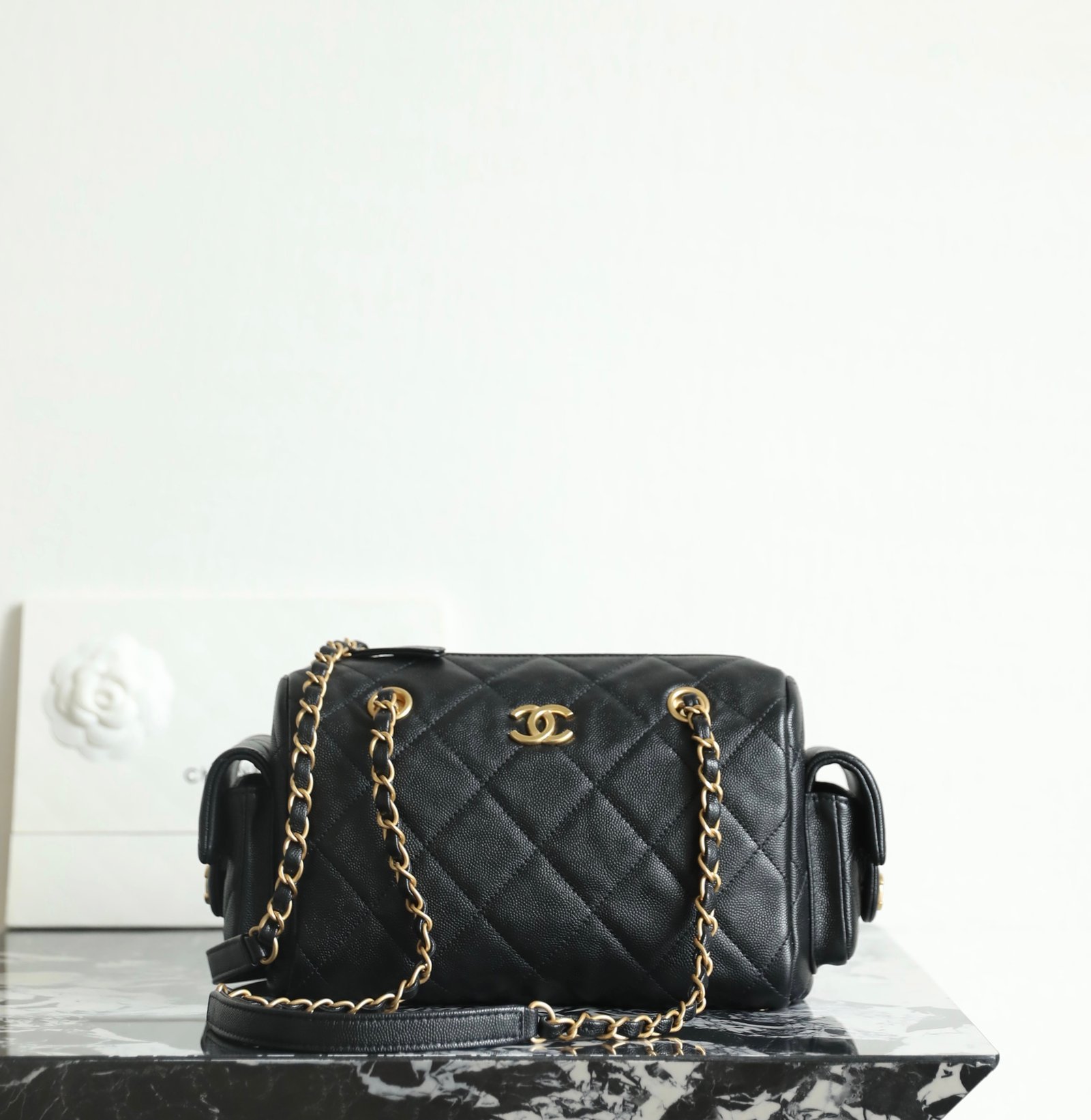 CHANEL Hobo Bowling Bag – Black Caviar & 24K Vintage Gold detail image 1 sourced from womanlvbag.com