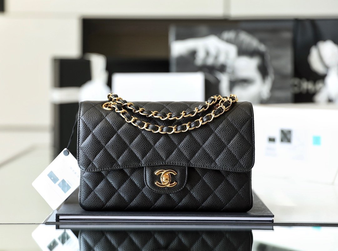 Classic Chanel bag: black caviar Chanel Small Classic Double Flap with gold hardware, front view