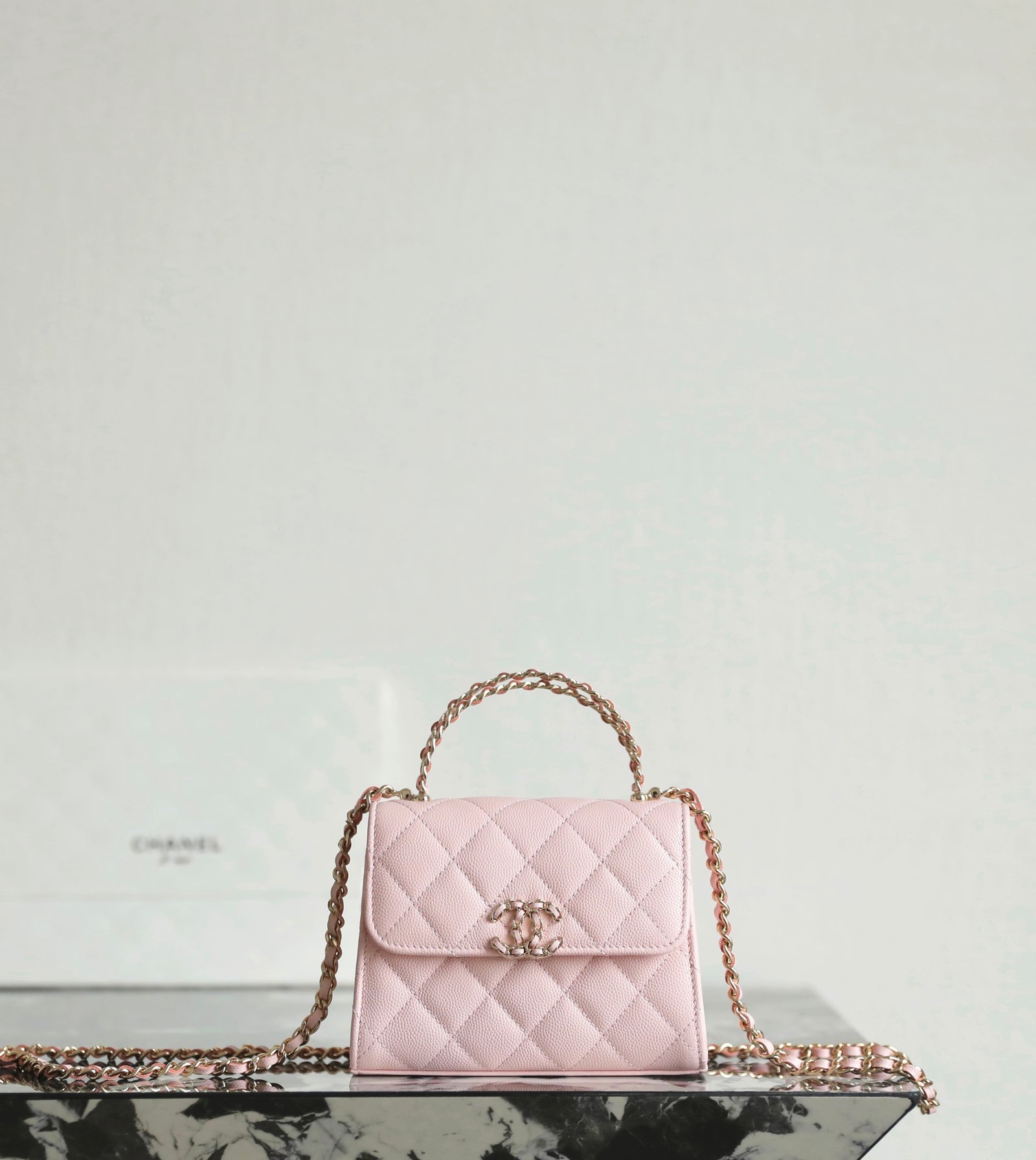 CHANEL Mini Small Kelly Crisscross Handle Flap Bag – Light Pink Caviar with 14K Light Gold Hardware detail image 1 sourced from womanlvbag.com
