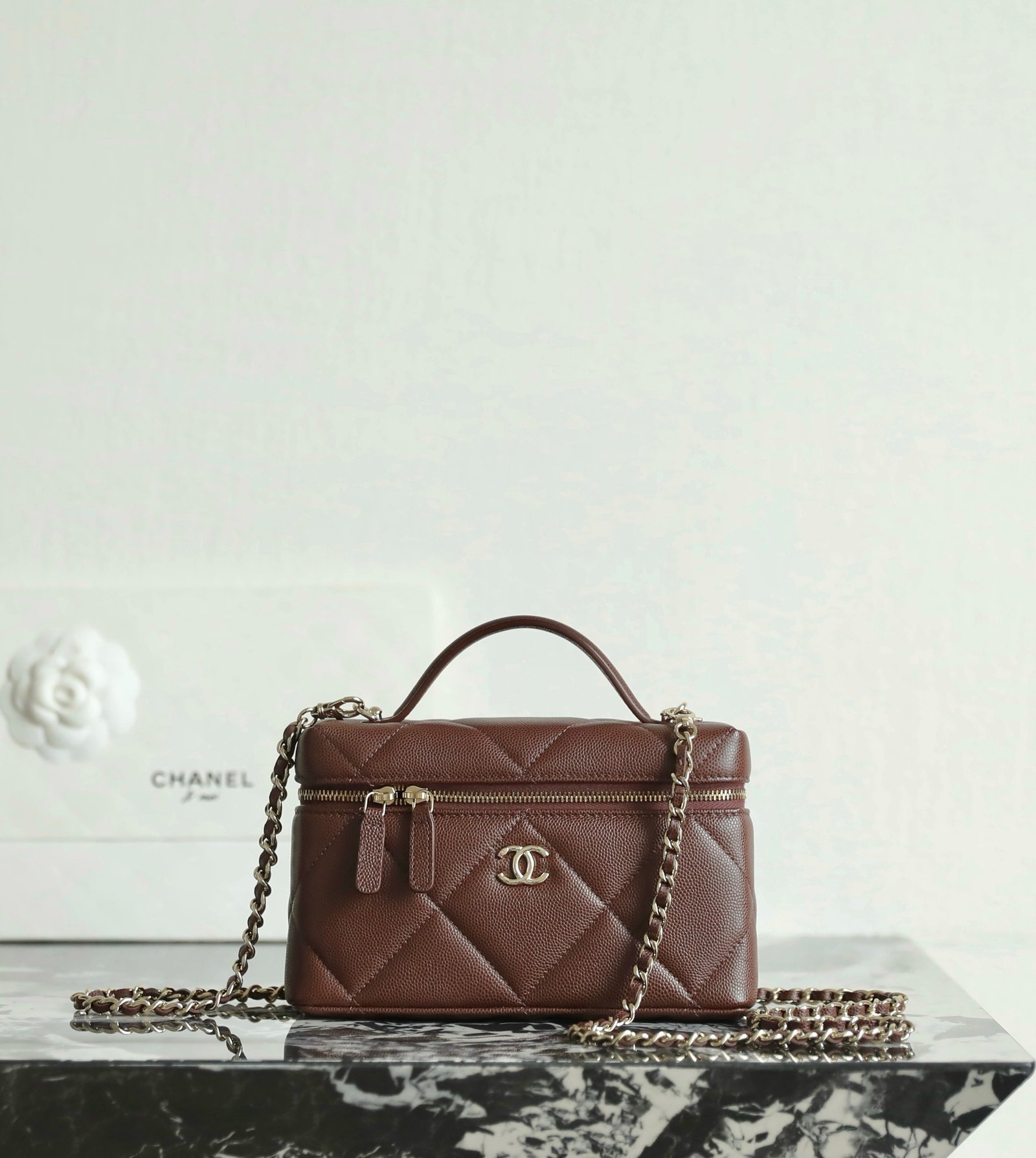 CHANEL Vanity Case with Chain – Chocolate Brown Calfskin with 14K Light Gold Hardware detail image 1 sourced from womanlvbag.com