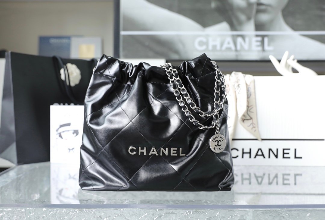 CHANEL Small 22 Bag – Black Shiny Calfskin Leather with Silver-Tone Hardware detail image 1 sourced from womanlvbag.com
