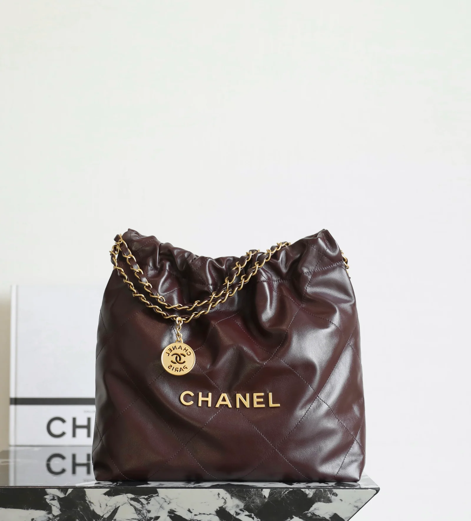 Chanel Small 22 Bag chocolate brown calfskin work commuting view 1