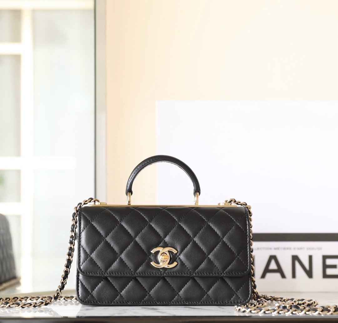 CHANEL Trendy CC Accordion Flap Bag with Top Handle – Black Lambskin & 14K Light Gold Hardware detail image 1 sourced from womanlvbag.com