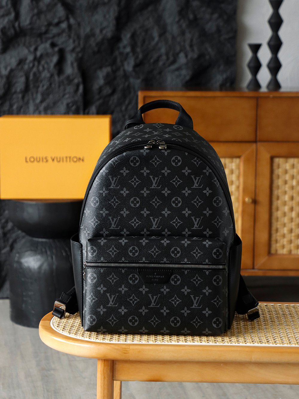 M22558, made of Monogram Eclipse coated canvas body, black cowhide leather trim, and textile lining detail image 1 sourced from womanlvbag.com