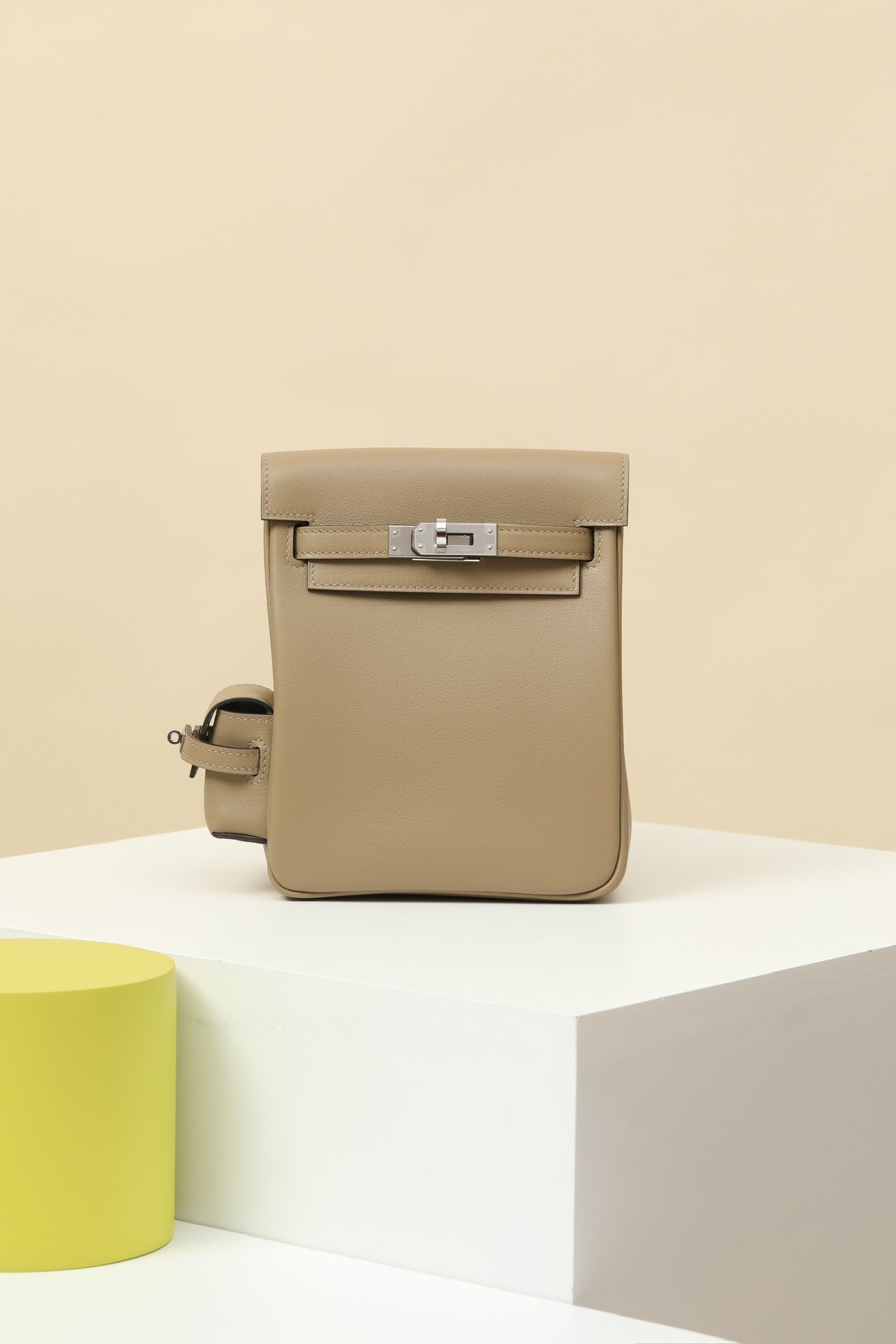 Hermes HAC a Dos Beige PM backpack in Beige Marfa Swift leather with palladium hardware, front carry view