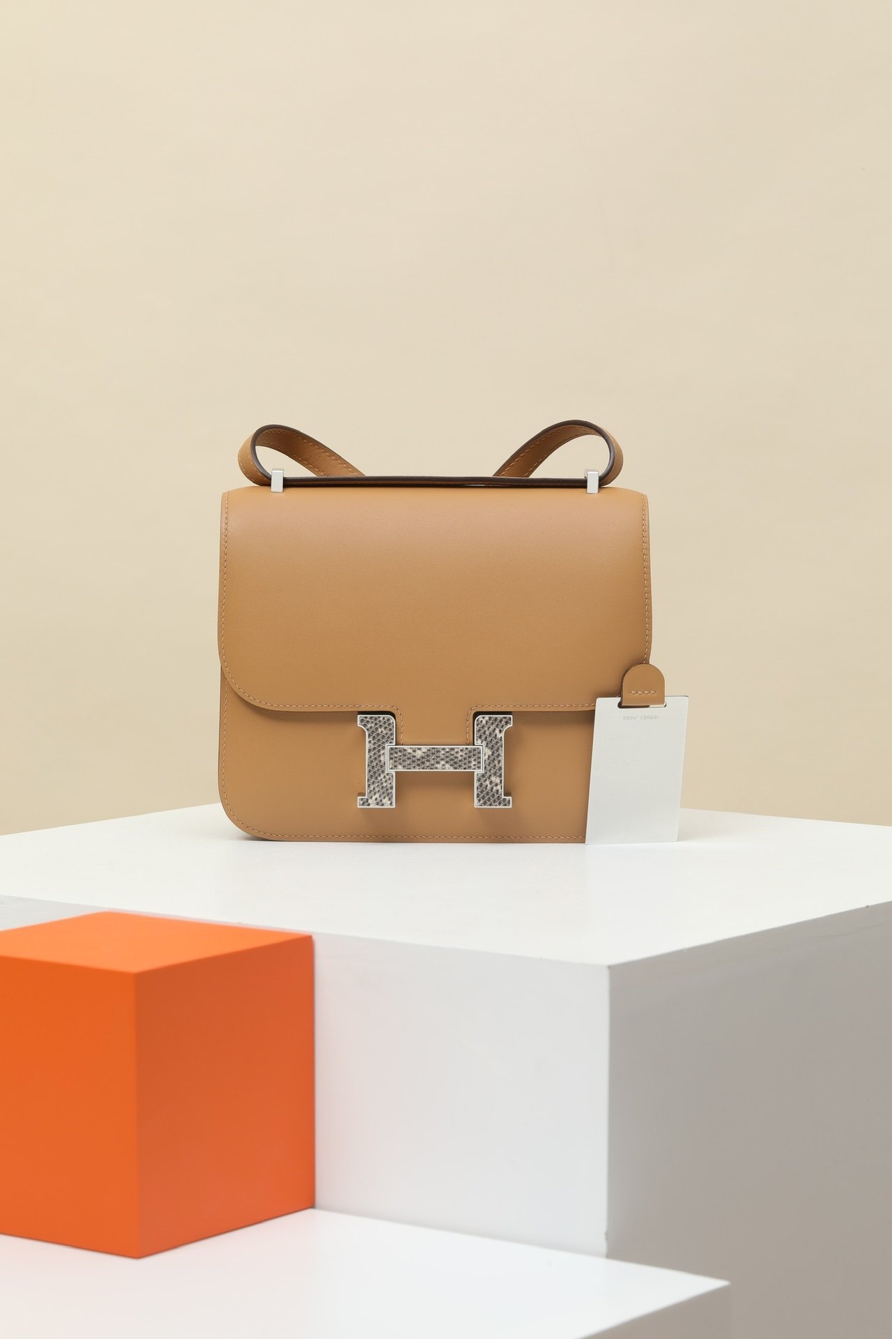 Hermès Constance 19 Touch – Matte Box & Salvator Lizard 4B Biscuit/1B Naturel PHW comparison image 2 sourced from womanlvbag.com