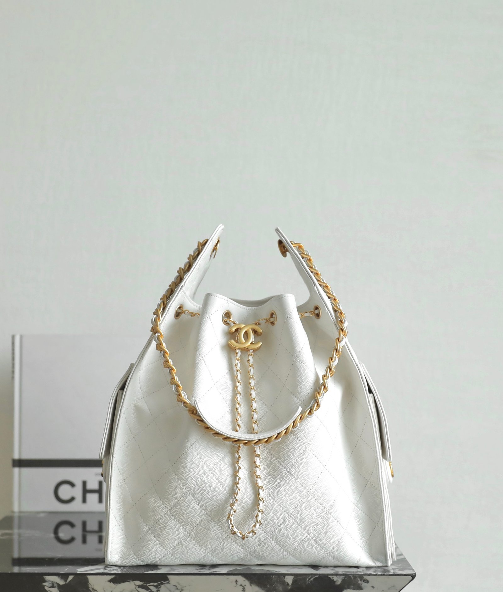 Chanel 25 Medium Hobo Bag in White detail image 1 sourced from womanlvbag.com