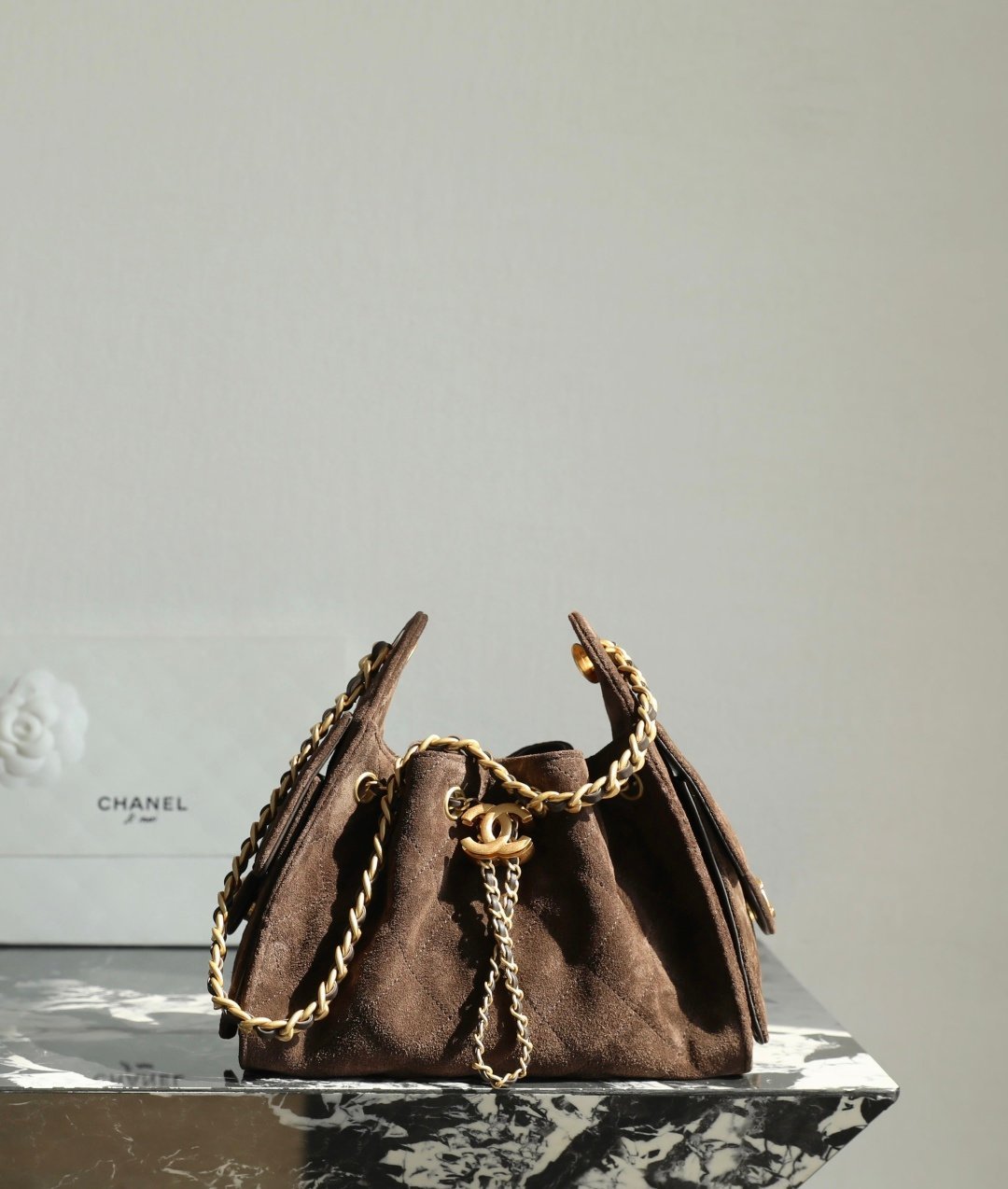 Chanel 25 Hobo Bag Mini in Chocolate Suede detail image 1 sourced from womanlvbag.com