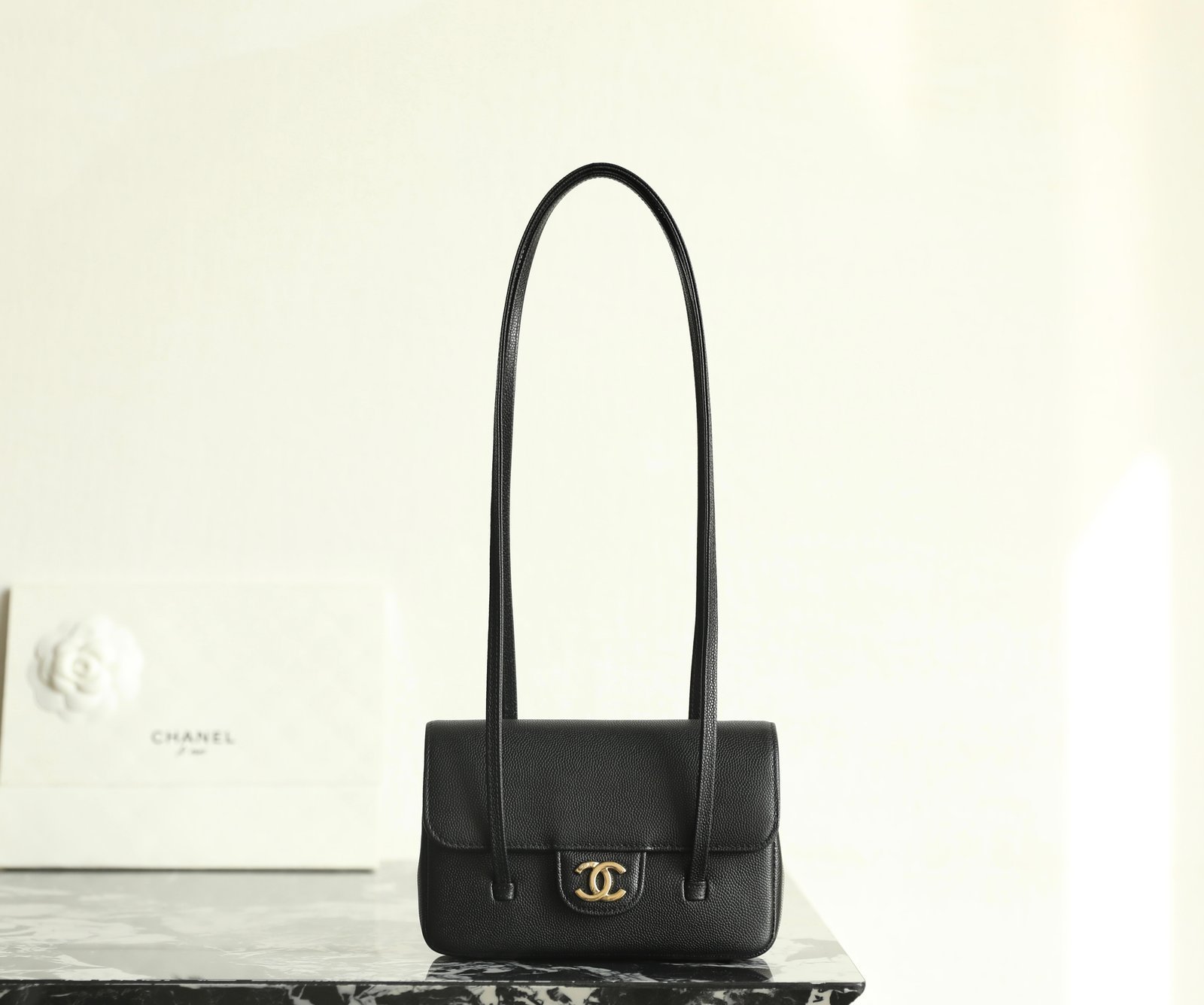 CHANEL 26P Preppy Coco Mini Clutch (Black Caviar & Retro Gold) detail image 1 sourced from womanlvbag.com